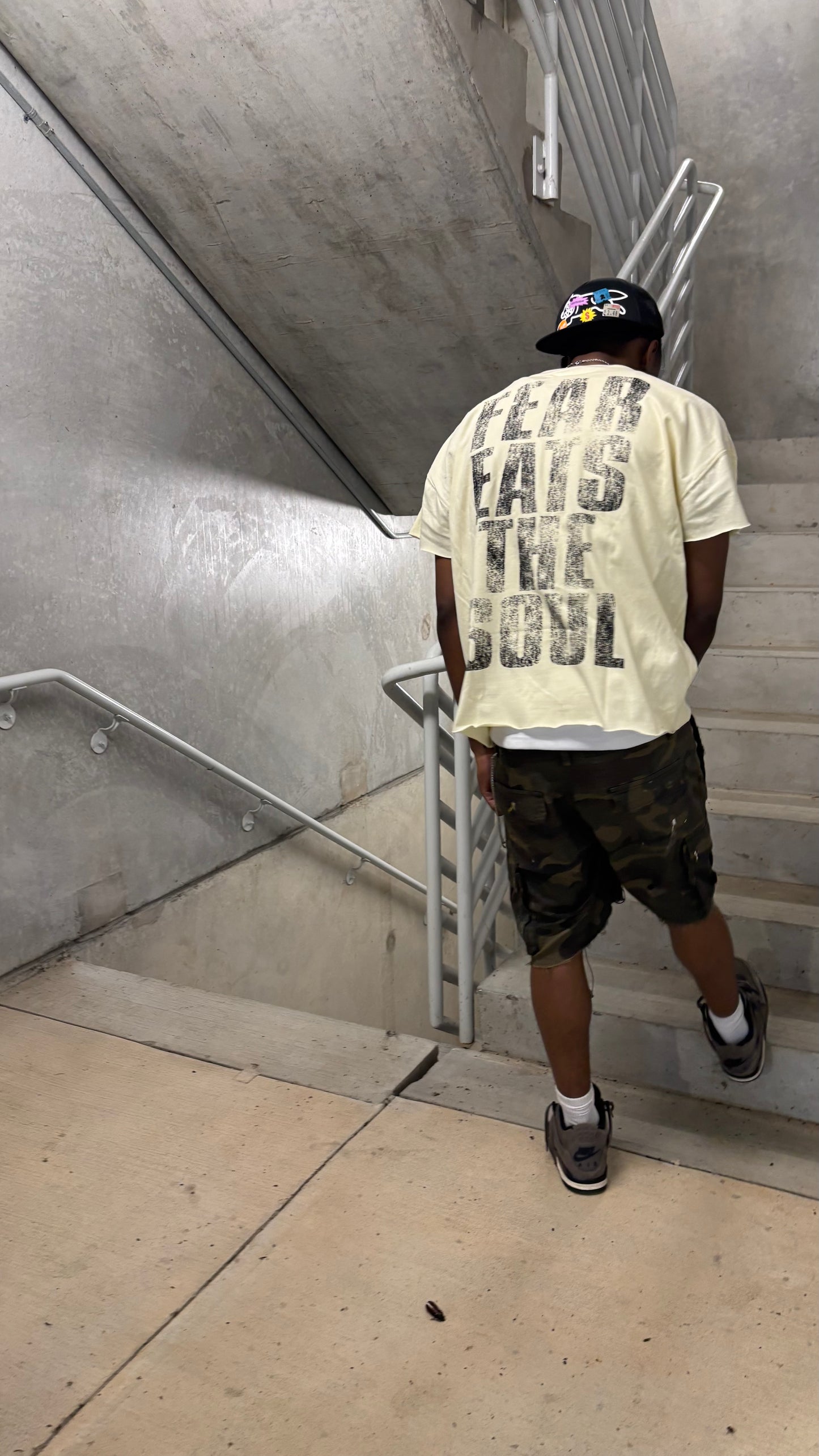 “Overwhelmed” sleeveless
